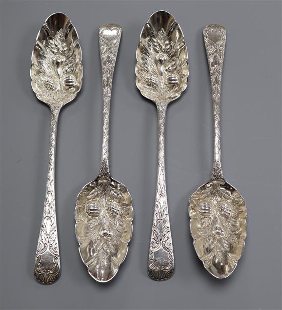 A set of four George III silver Old English pattern later decorated berry spoons, Eley & Fearn, London, 1805, 7.5 oz.
